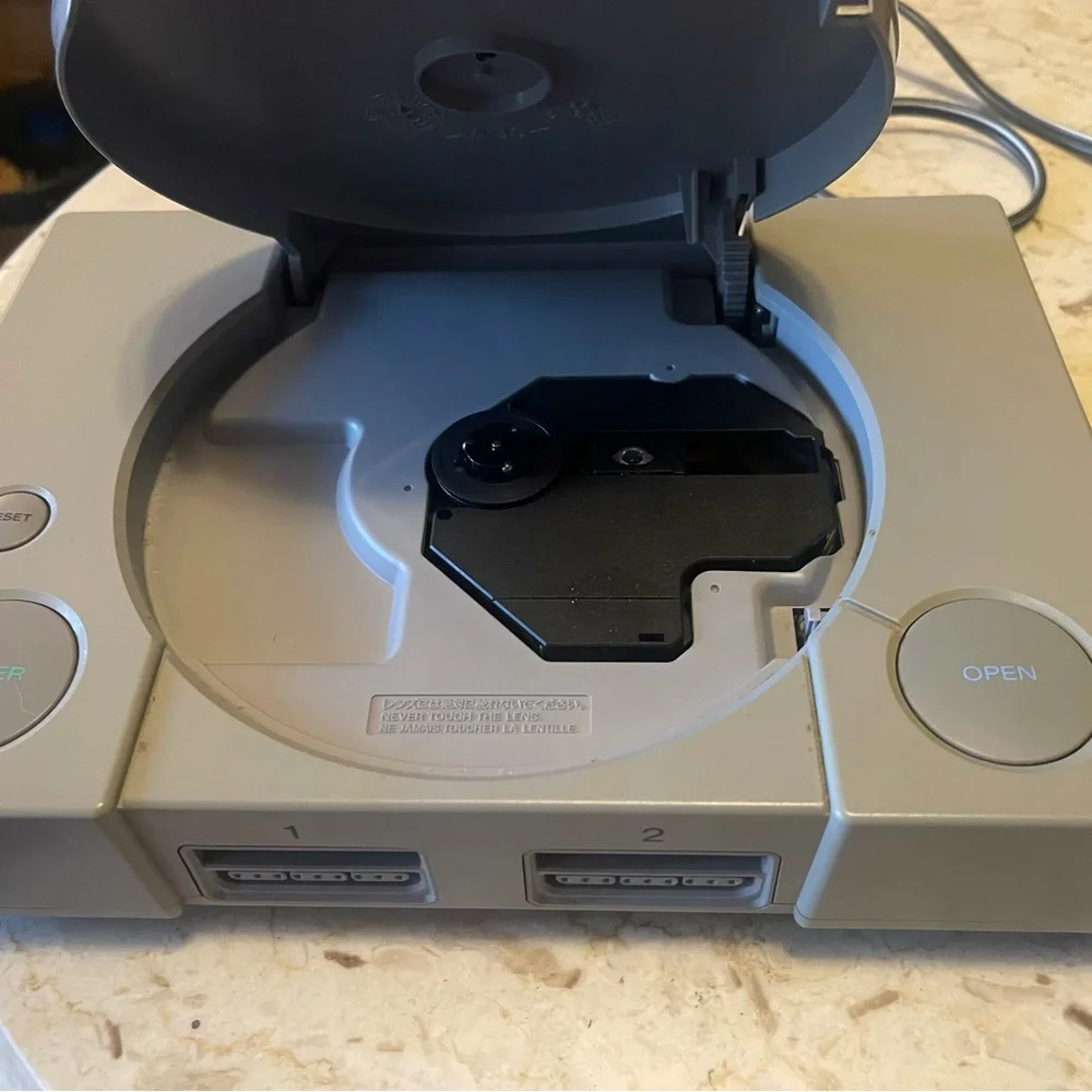 Sony PlayStation Classic in Gray with controller and cords